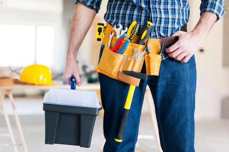 Home service contractor with tools and equipment ready for dispatched service calls